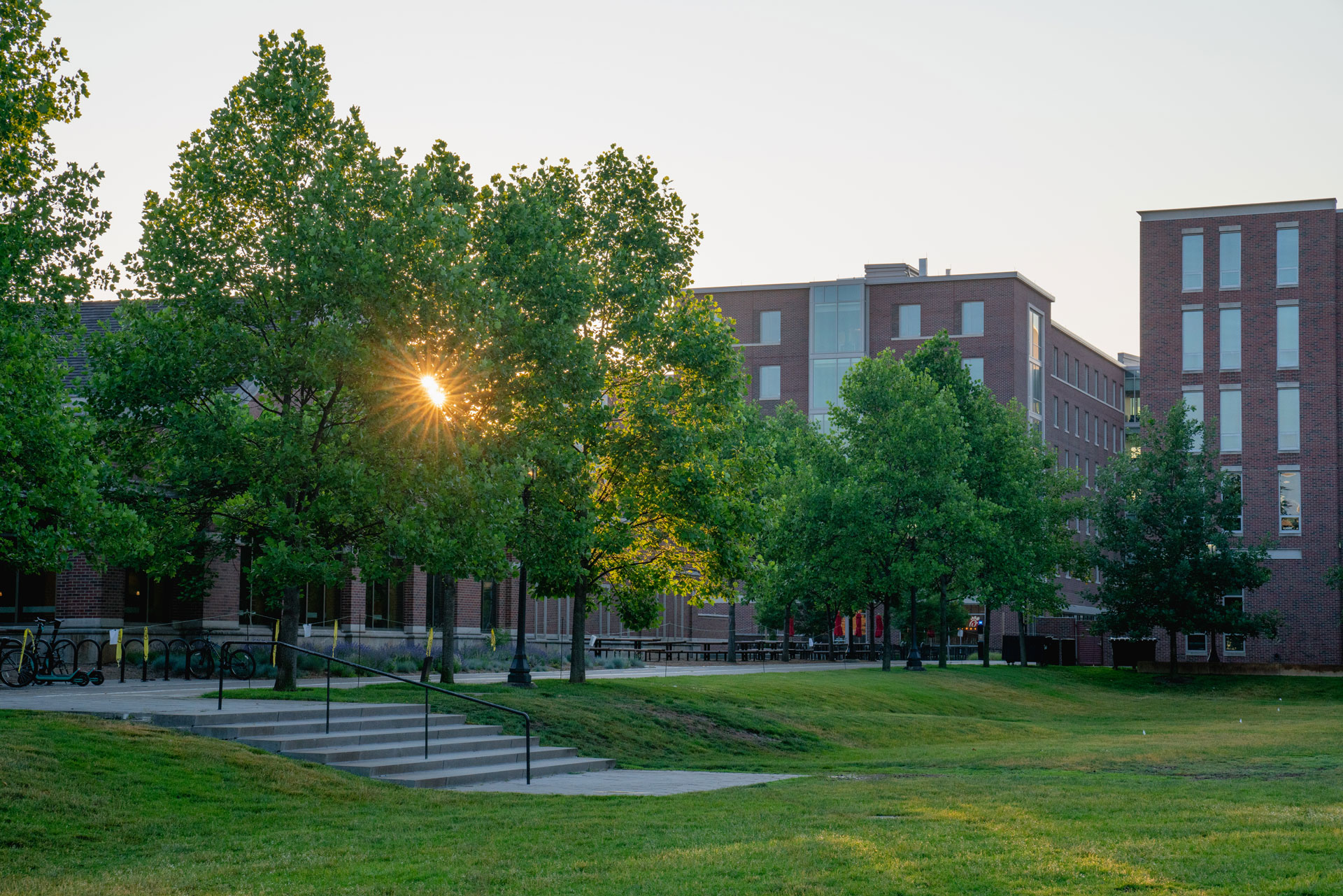 A scenary photo of Purdue campus during the sunset time.
